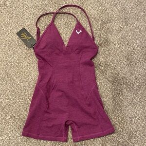 Brand new never worn one piece gym outfit